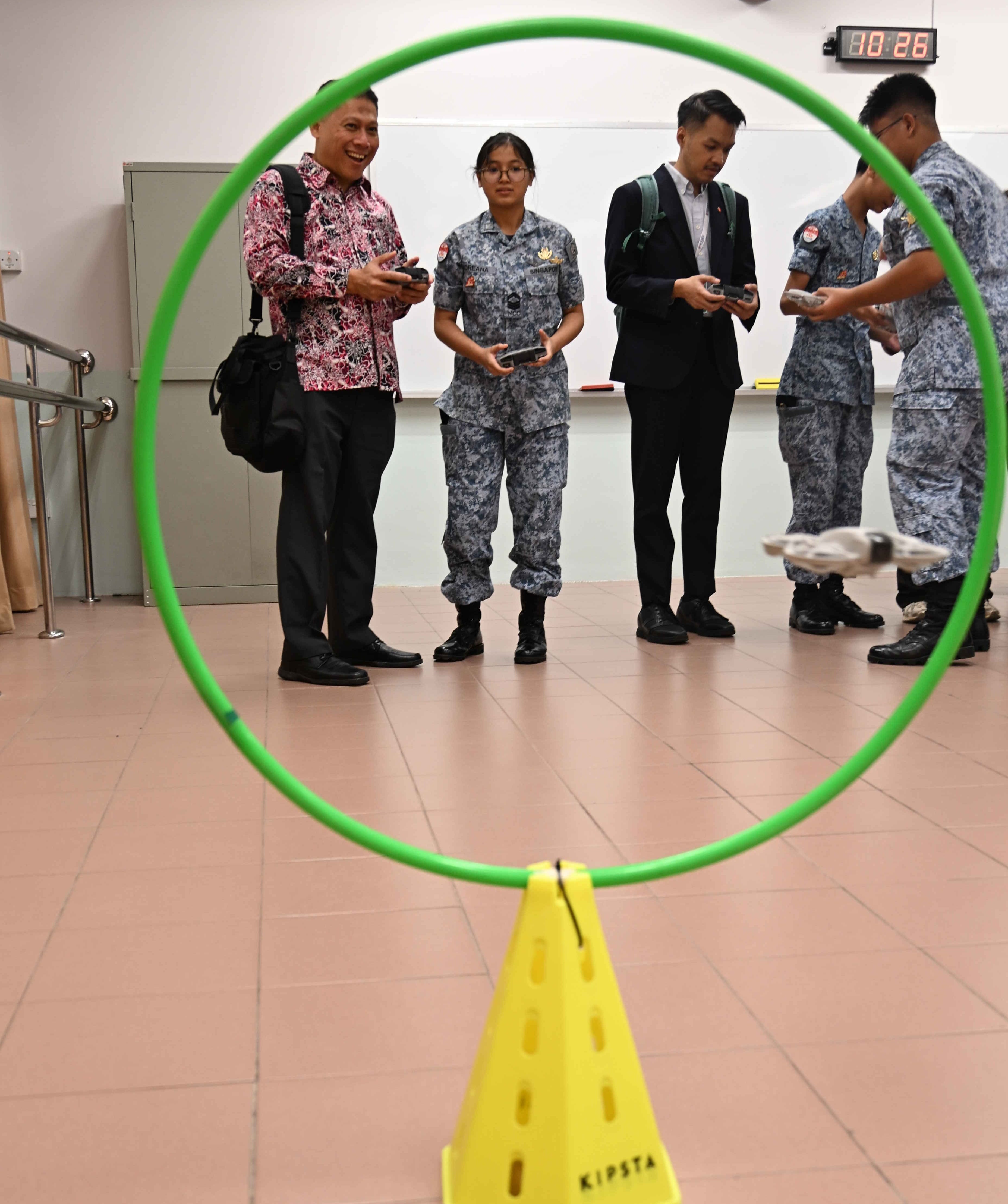 Our students explaining to the ASEAN delegates.